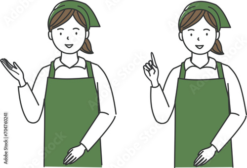 案内をするスーパーの女性店員