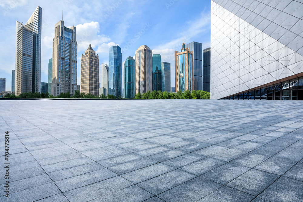 City square floor and modern office building in Shanghai - obrazy, fototapety, plakaty 