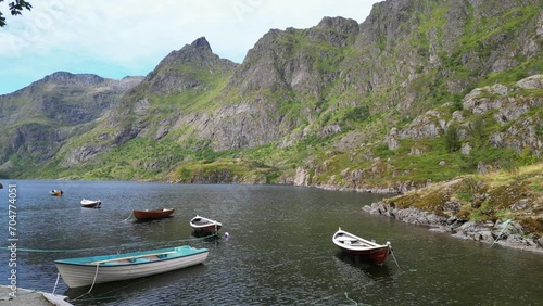 Boats and Fjords at Agvatnet lake in Lofoten Islands, Norway - Pan Left photo