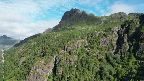 Lofoten Islands Mountain Landscape in Svolvaer, Norway - Aerial 4k Tilting Up photo