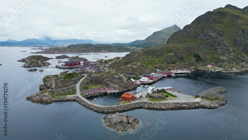 Mortsund Fishing Village at Lofoten Islands, Norway - Aerial 4k Circling photo