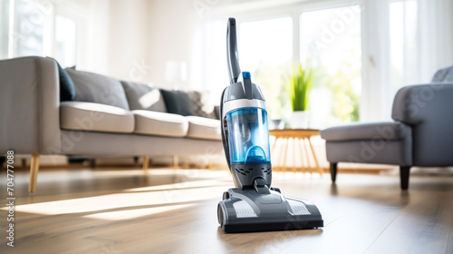 Resident maintains order, maneuvering a vacuum with ease in a stylish apartment.