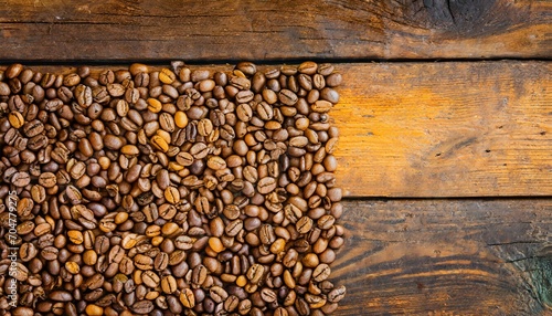 Best-selling specialty coffee beans on rustic Brown wood background © Hamad Baloch