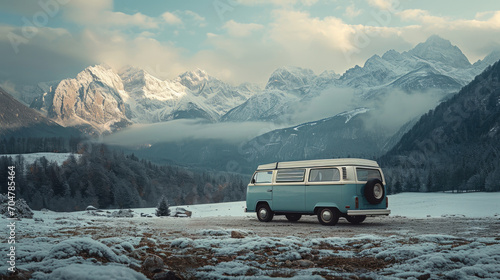 Van parked in snow near mountains, depicts a snowy landscape with a van, suitable for winter travel, adventure, and outdoor recreation designs, or as a background for seasonal promotions. © Planetz