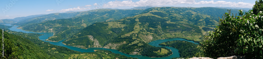 Panorama of the mountains and Lake Zavoj on a sunny summer day Panorama of the mountains and Lake Zavoj on a sunny summer day
