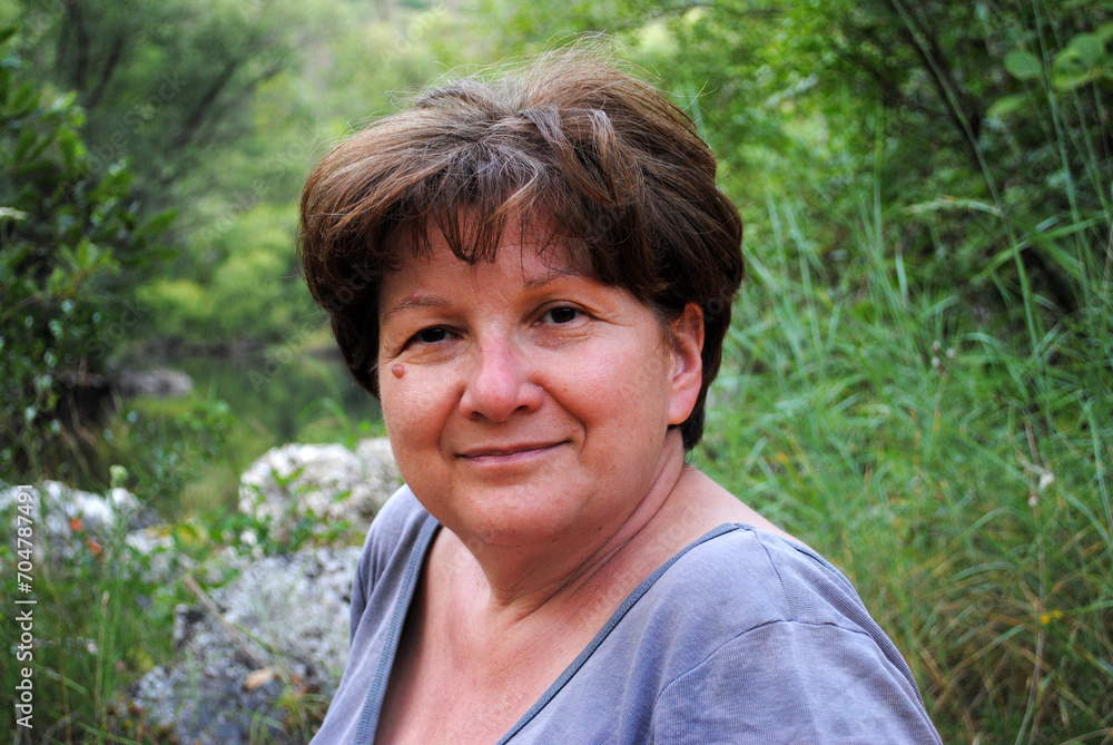 Outdoor Portrait of a beautiful senior woman after retirement Outdoor Portrait of a beautiful senior woman after retirement