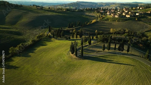 Drown descends orbitting around winding road down picturesque mountain, Val d'Orcia Tuscany photo