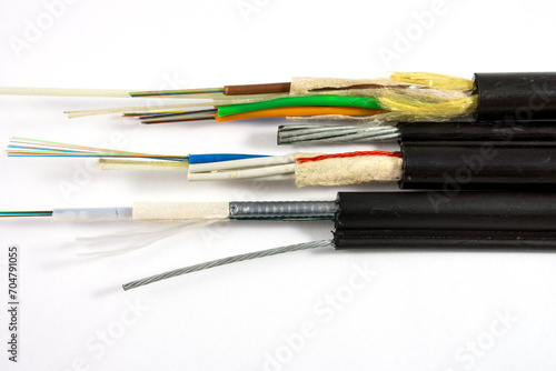 Structure of Figure (8) and ADSS Optical Fiber Cables isolated on white background. They consist of messenger wire OFC cables with and without steel armor. photo