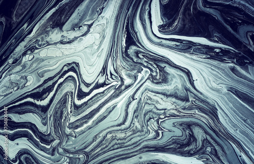 art photography of abstract marbleized effect background with black, dark blue and white creative colors. Beautiful paint.