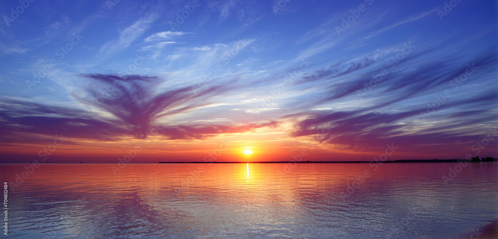 Glorious sunset over a bay beach