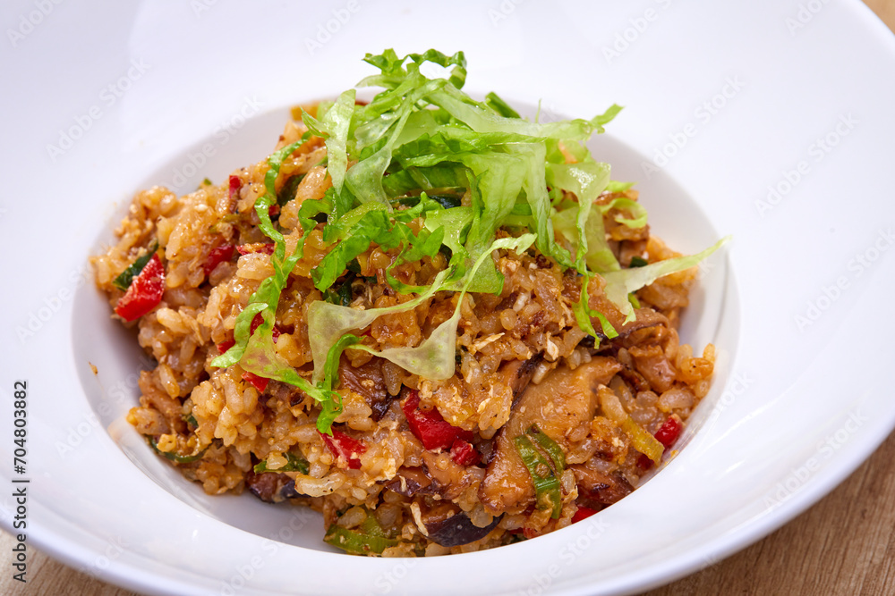 fried rice with vegetables on white plate fried rice with vegetables on white plate