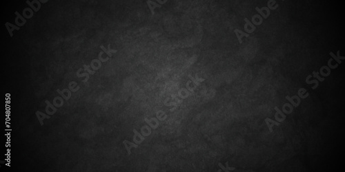 Abstract dark black rough material old overlay grunge wall vintage texture dark gray charcoal blackboard. dark black backdrop dark color cement floor or concrete texture. photo