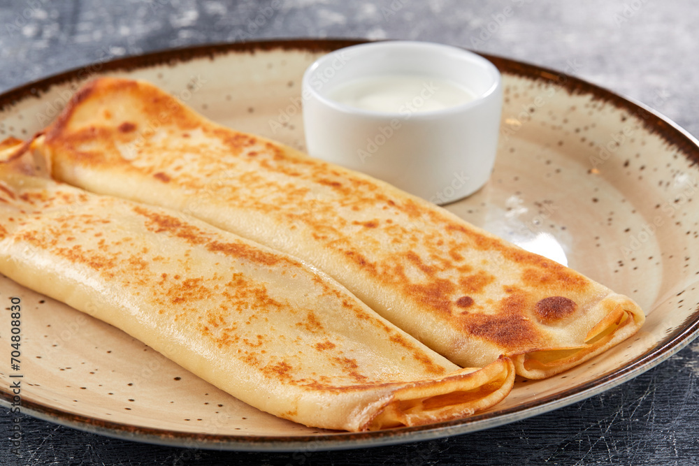 stuffed pancakes with sour cream stuffed pancakes with sour cream