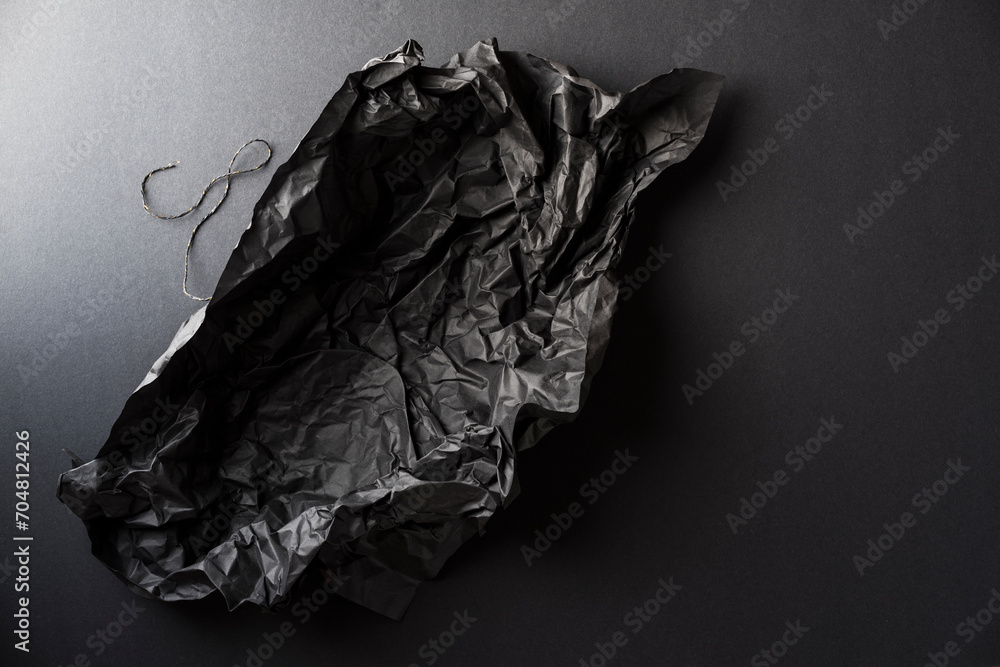 Empty crumpled black wrapping paper