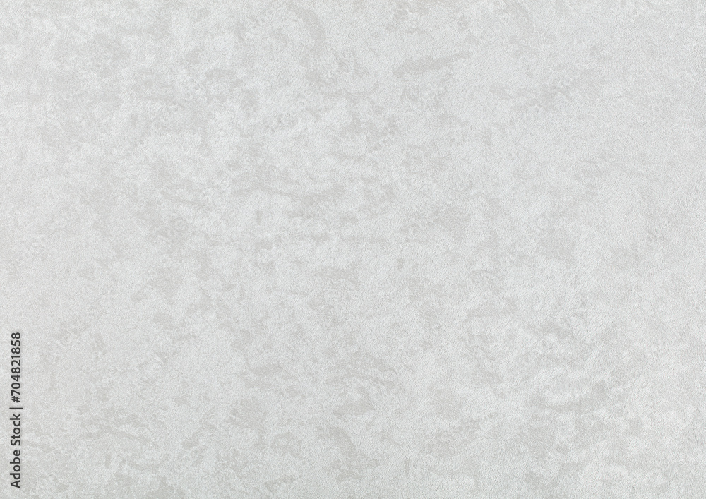 Obraz premium The texture of white paper wallpaper is white with textured chaotic gray small spots.