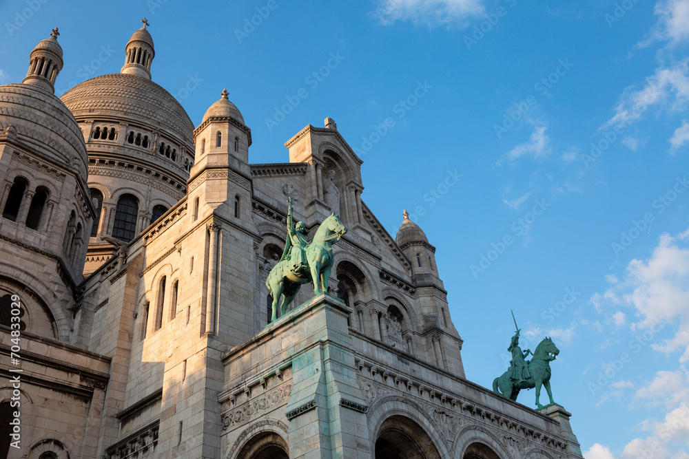 Paris, France - May 20, 2023: view on the exterior of the Basilica of the Sacred Heart of Paris Montmartre Paris, France - May 20, 2023: view on the exterior of the Basilica of the Sacred Heart of Paris Montmartre