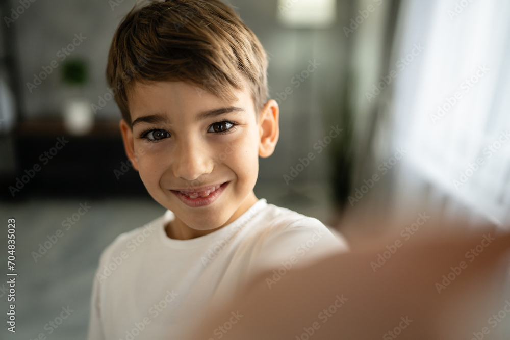 One boy caucasian child seven years old kid at home schoolboy portrait One boy caucasian child seven years old kid at home schoolboy portrait