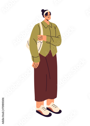 Young woman carrying shoulder bag. Cute girl wearing long skirt in street style, standing. Fashionable people walking in stylish urban outfit. Flat isolated vector illustration on white background