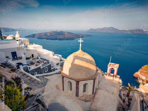 Attractive morning view of Santorini island with old dome. Captivating summer scene of famous Greek resort - Fira, Greece, Europe. Traveling concept background.