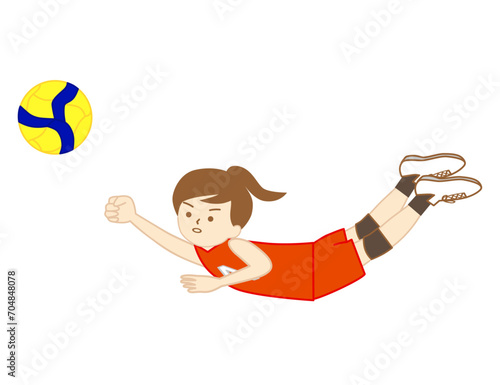 バレーボールの試合でフライングレシーブをするリベロの女の子