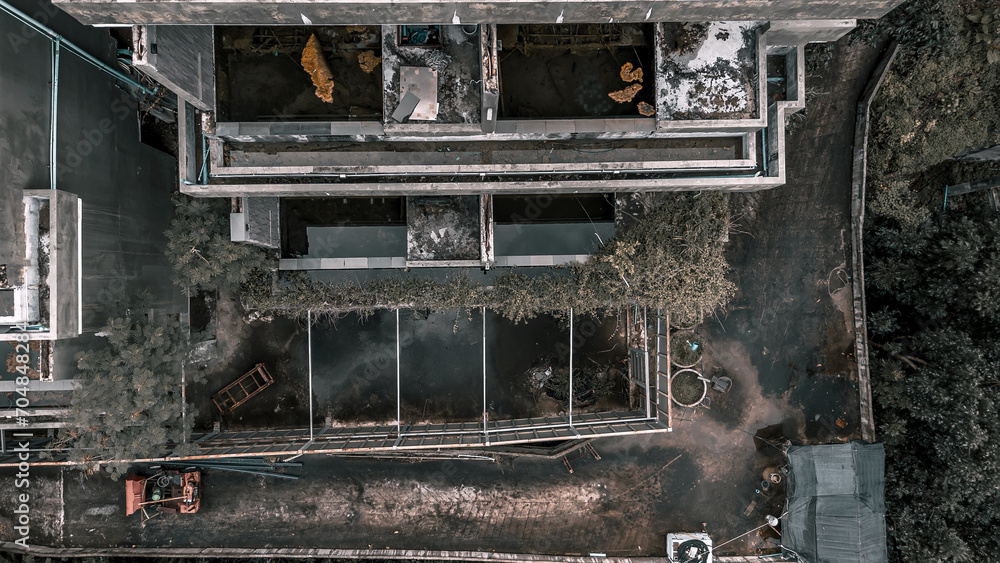 A beautiful abandoned hotel on the mountain. Plants on balconies. Shabby walls. Large abandoned hotel. A beautiful abandoned hotel on the mountain. Plants on balconies. Shabby walls. Large abandoned hotel.