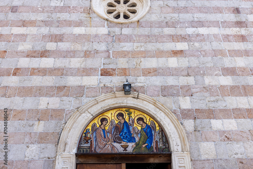 Religious themed mosaic above the entrance to the Holy Trinity Orthodox Church, Budva, Montenegro