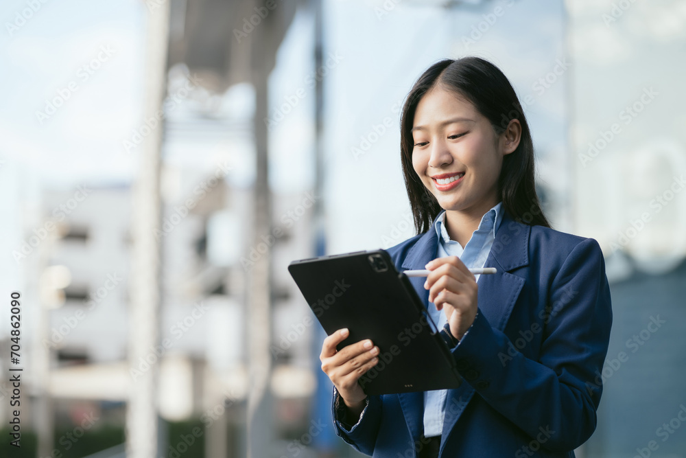 Email notification concept, Business woman use Tablet and laptop receive message alert in the mailbox. Email notification concept, Business woman use Tablet and laptop receive message alert in the mailbox.