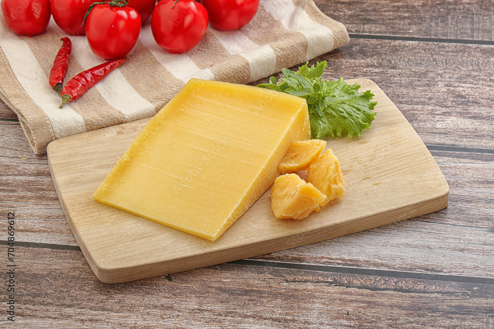 Parmesan hard cheese with small pieces Parmesan hard cheese with small pieces