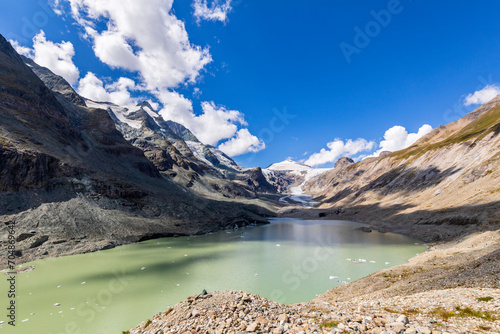 Sandersee lake in front of mountains at Grossglockner, Austria photo