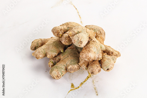 Raw ginger root fot cooking photo