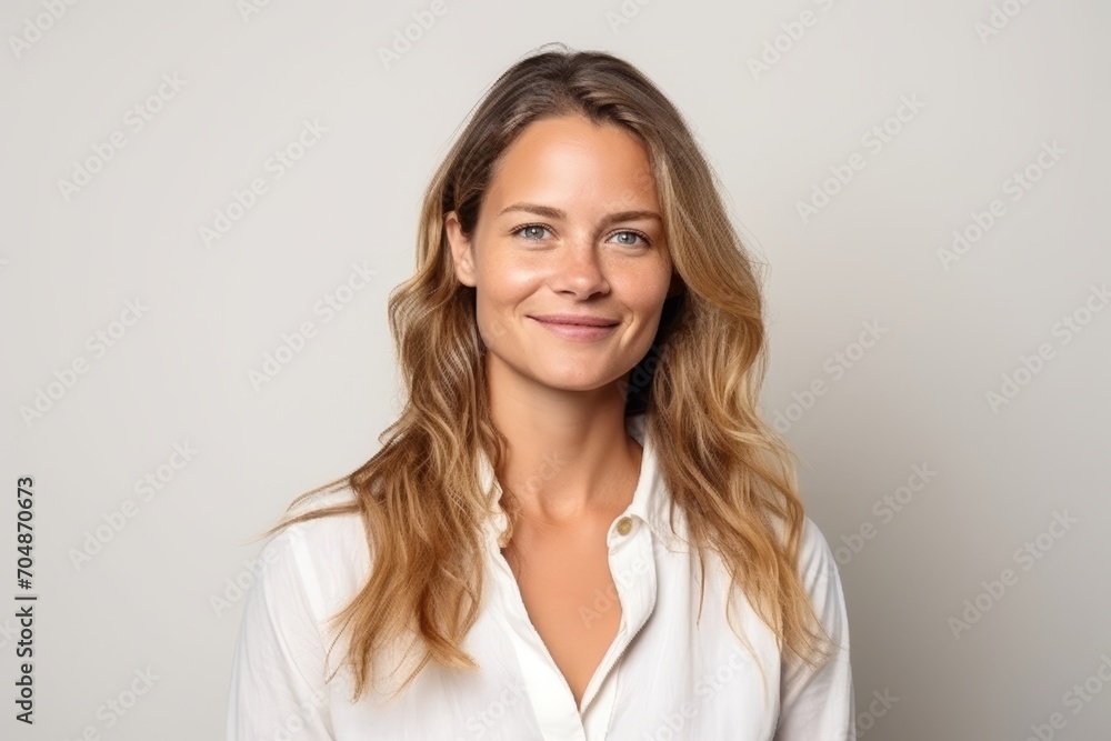 Portrait of a beautiful young businesswoman smiling at the camera. Portrait of a beautiful young businesswoman smiling at the camera.