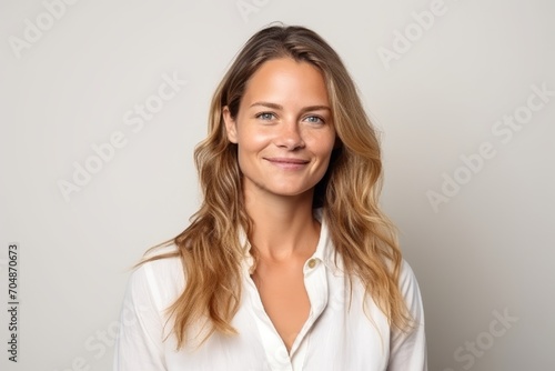 Portrait of a beautiful young businesswoman smiling at the camera.