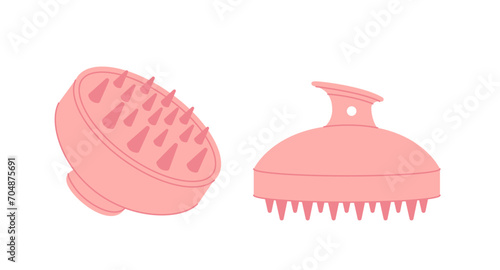 Pink scalp massage brush set on white background