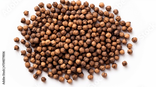 a ile of black chickpeas against a white background.