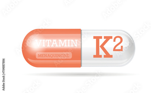 Vitamin K2 capsule. Pink and white color. Vitamin complex with chemical formula. Personal care, beauty concept. copy space.