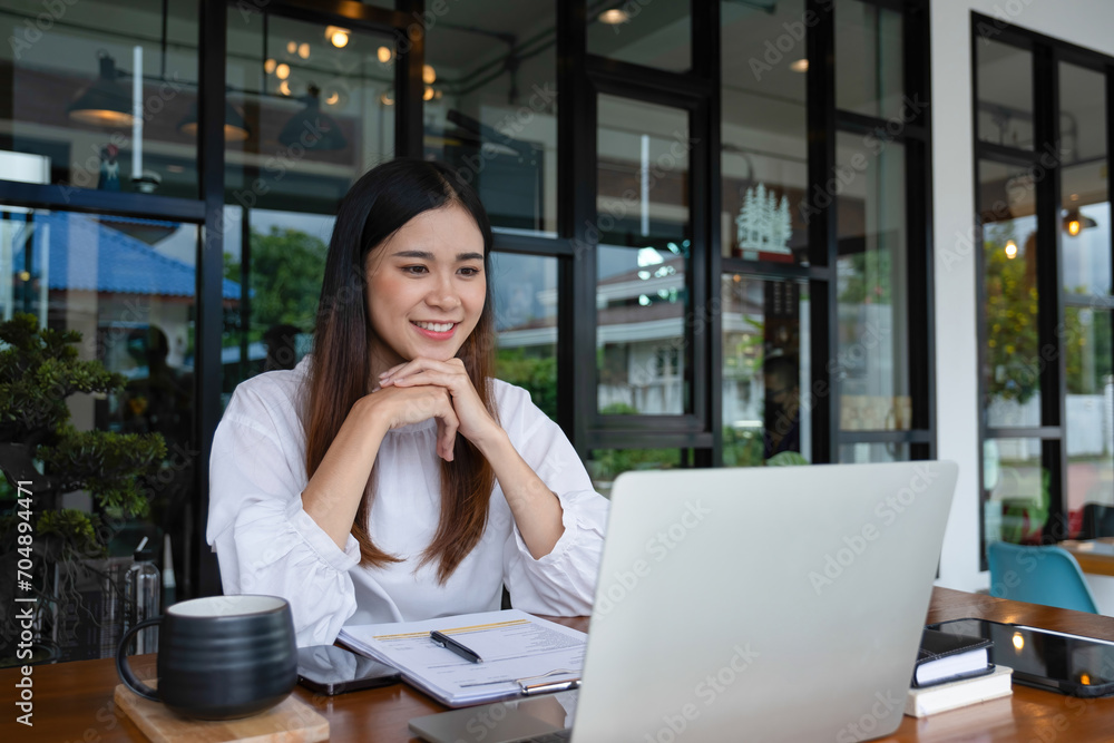 Businesswomen drive online store success together. Businesswomen drive online store success together.