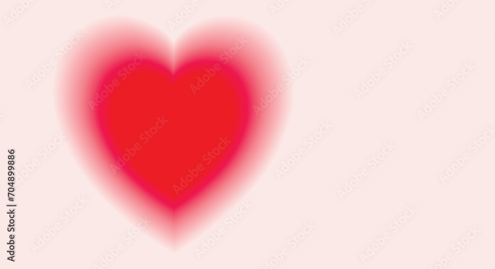 Bright red heart with blurred gradient borders on a pink background. Valentine's Day. Awareness and care concept. Copy space.