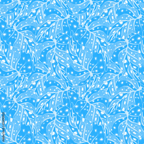 Seamless all over blue tropical leaves print