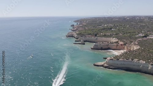 Aerial seascape in Albandeira, popular beach destination of Algarve rocky cliff coast. South Portugal. photo