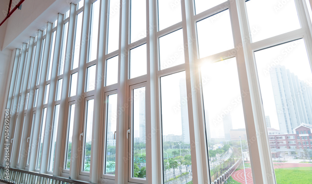 A row of narrow windows in modern building A row of narrow windows in modern building