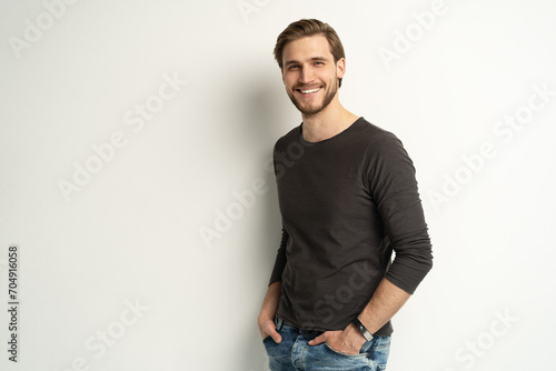 Portrait of happy casual handsome man smiling, Mid adult guy Isolated on white background, copy space © opolja