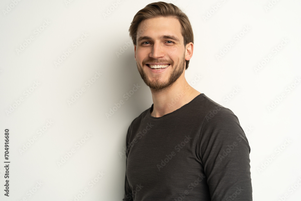 Portrait of happy casual handsome man smiling, Mid adult guy Isolated on white background, copy space Portrait of happy casual handsome man smiling, Mid adult guy Isolated on white background, copy space