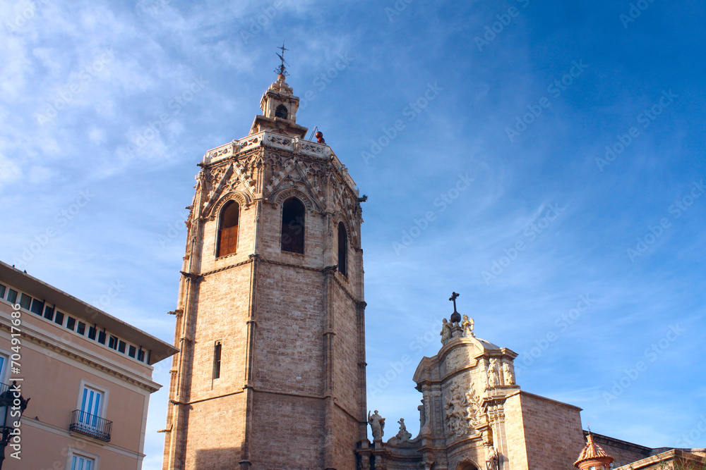  Metropolitan Cathedral and Micalet Tower at Plaza de la Reina in Valencia, Spain