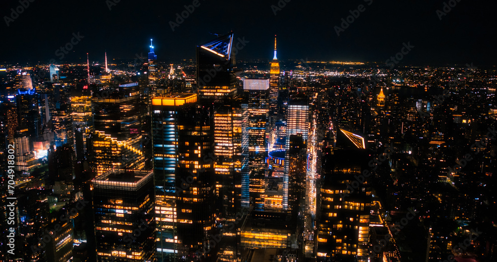 Aerial Helicopter View of Downtown Manhattan Architecture. Drone Photo of Skyscrapers and Office Buildings at Night. Evening Urban Landscape with Historic New York City
