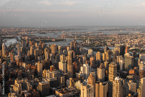 Scenic Aerial New York City Daytime View of Lower Manhattan Architecture. Panoramic Downtown Photo from a Helicopter at Sunset. Cityscape with Modern Office Buildings and Historic Skyscrapers