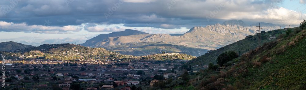 XL Pano from Mount Palermo over remote village houses, a green valley and the mount Pellegrino , Gibilrossa, Palermo