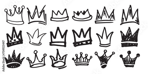 Crown isolated on white background in brush drawn symbol.