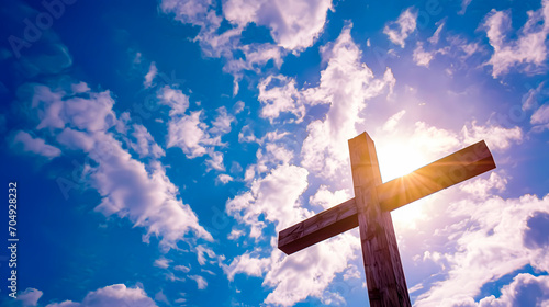 A wooden cross under a blue sky. Catholic Holy Week concept. Easter photo