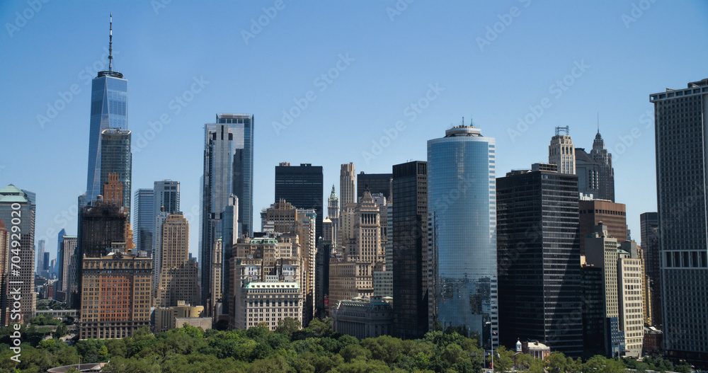 Scenic Aerial New York City View of Lower Manhattan Architecture. Panoramic Downtown Footage from a Helicopter During a Sunny Day. Cityscape with Modern Office Buildings and Historic Skyscrapers