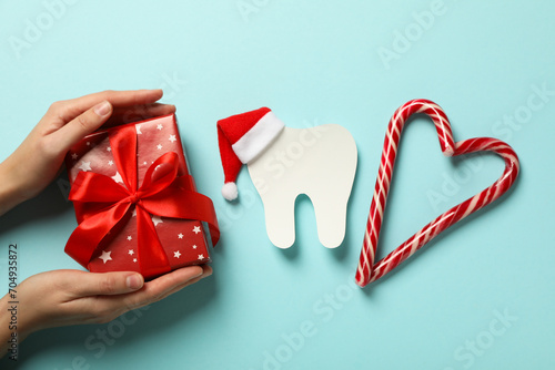 Teeth with Christmas accessories around, flat lay. photo